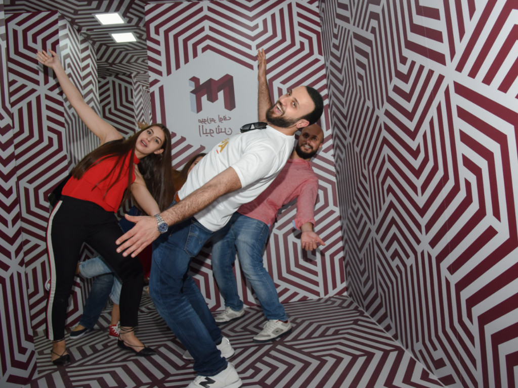 Group of people chilling at museum of illusions